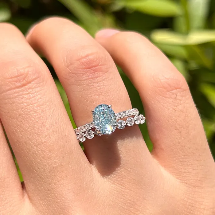 Rings Carly Jewelry 2 Pcs Stunning Blue Oval Cut Sterling Silver Bridal Set