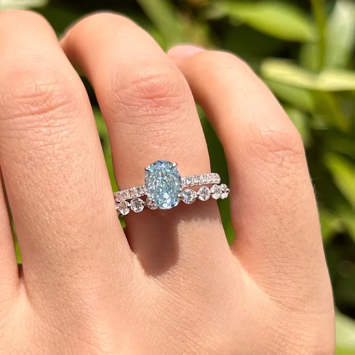 Rings Carly Jewelry 2 Pcs Stunning Blue Oval Cut Sterling Silver Bridal Set